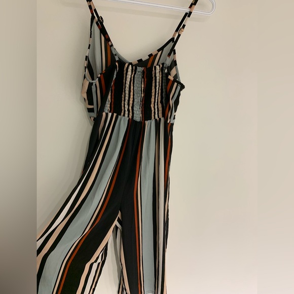 Stripped romper with adjustable straps. - Picture 3 of 6
